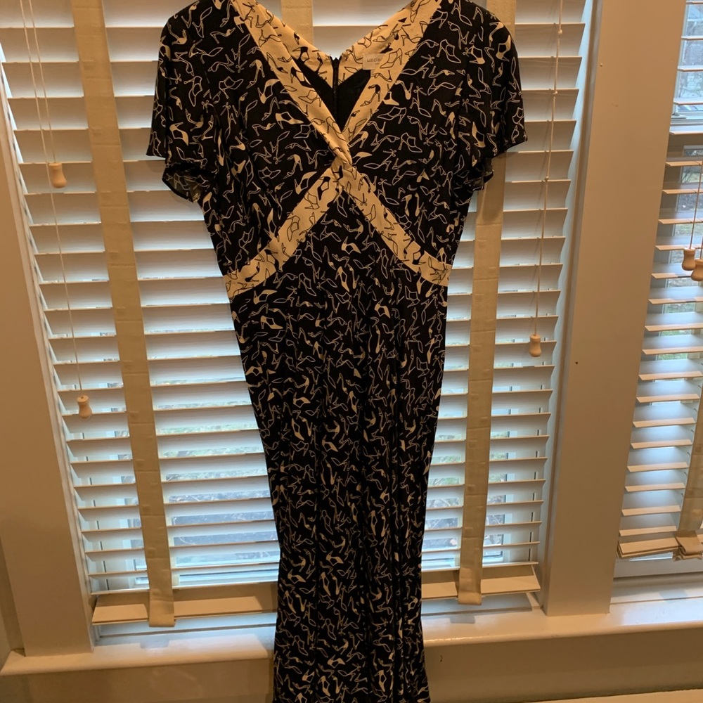 Fit along the breast with a flair around the waist